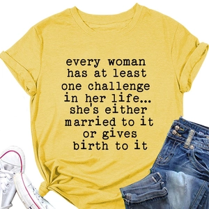 Flat lay of ginger yellow crewneck T-shirt with printed text, denim shorts and sneakers