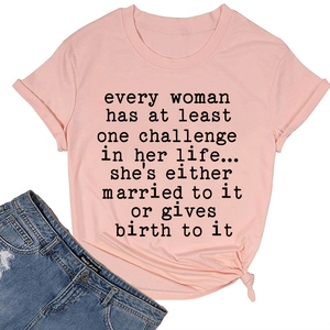 Detail of pink cotton T-shirt with knot hem design and printed humor quote for women