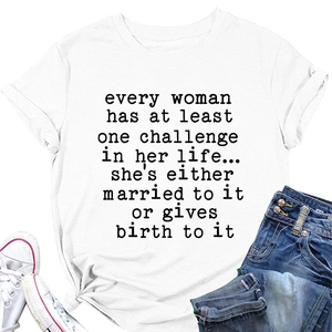 Close-up of a white crew neck T-shirt with black slogan print and casual denim styling