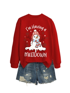 Detail of red sweatshirt with melting snowman print and ripped denim shorts