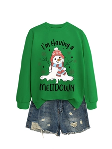 Detail of green crewneck sweatshirt with melting snowman print and distressed denim shorts