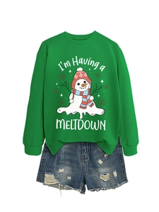 Detail of green crewneck sweatshirt with melting snowman print and denim shorts
