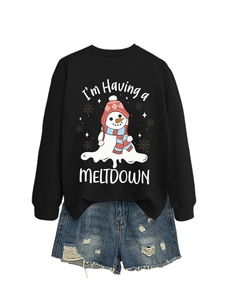 Detail of crewneck sweatshirt featuring a melting snowman print and casual distressed denim