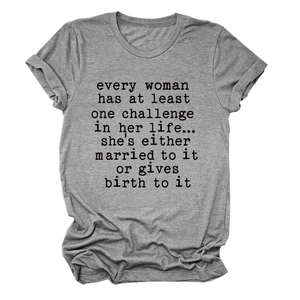 Close-up of gray cotton t-shirt fabric texture and quote print with rolled sleeves