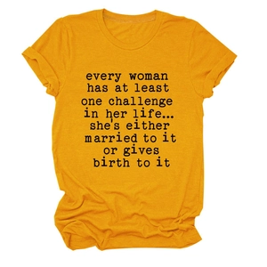 Detail of loose mustard yellow crewneck t-shirt with black artistic slogan lettering