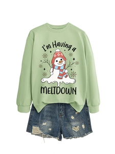 Detail of light green sweatshirt with melting snowman and I am having a meltdown text