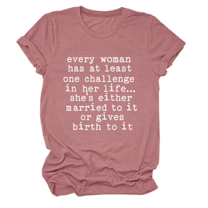 Detail of rolled cuffs and white letter print on a dusty pink crewneck t-shirt