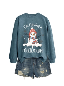 Navy sweatshirt with melting snowman print paired with ripped blue denim shorts