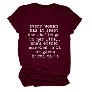 Detail of burgundy cotton t-shirt with rolled sleeves and white typewriter text