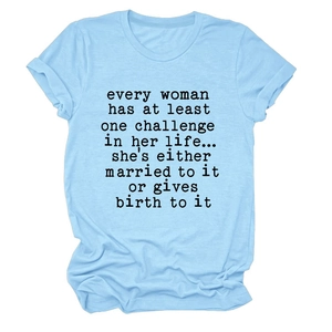 Detail of light blue cotton t-shirt with rolled sleeves and black typewriter text print
