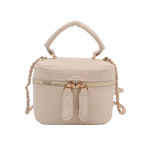 Elegant beige quilted mini box bag with gold chain strap and top handle on white background