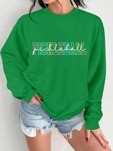Women's green long sleeve sweatshirt featuring colorful Pickleball print detail