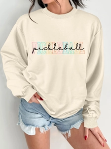 Detail of ribbed cuffs and high-quality cotton blend fabric on beige Pickleball sweatshirt