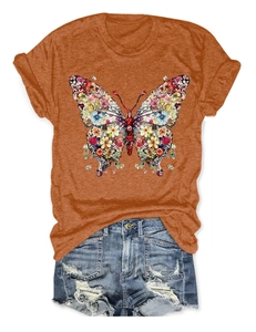 T-shirt orange brûlé avec imprimé papillon floral et mini short en jean délavé