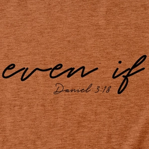 Close-up of black 'even if' and 'Daniel 3:18' print on terracotta knit cotton fabric
