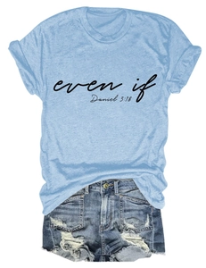 Flat lay of light blue crewneck T-shirt with 'even if' text and distressed denim shorts