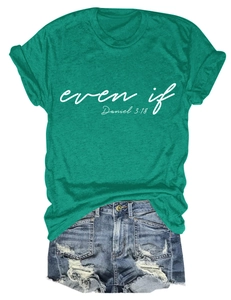 Detail of emerald green t-shirt with even if Daniel 3:18 text and distressed denim shorts