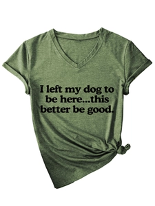 Detail of V-neck t-shirt in heather green with dog quote print and knotted hem design