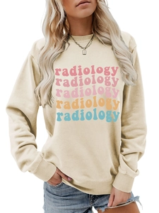 Detail shot of the colorful Radiology gradient lettering on a cream long sleeve sweatshirt