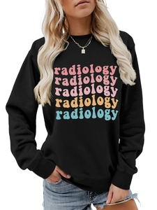 Detail of colorful radiology text print on black crewneck sweatshirt for women