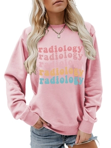 Detail of pink radiology sweatshirt with colorful gradient text and round neckline