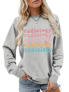 Close-up of colorful radiology lettering printed on a grey long sleeve sweatshirt