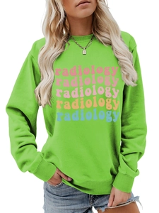 Detail of colorful radiology text print on neon green crewneck sweatshirt fabric