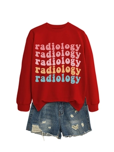 Detail of red crewneck sweatshirt with colorful Radiology print and denim shorts