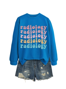 Detail of royal blue radiology print sweatshirt and distressed denim shorts set