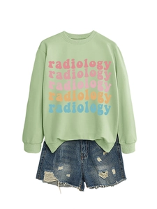Detail of radiology multi-color lettering on a mint green long sleeve sweatshirt