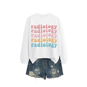 White crewneck sweatshirt featuring colorful retro radiology print and blue denim shorts