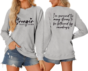 Front and back view of grey sweatshirt with Stronger Than The Storm lettering print