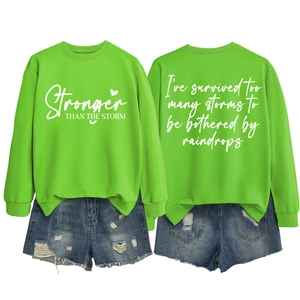 Front and back view of neon green sweatshirt with Stronger Than The Storm lettering