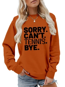 Detail eines orangefarbenen Sweatshirts mit dem Aufdruck SORRY CAN'T TENNIS