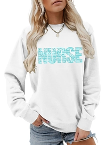 Detail of white nurse sweatshirt with teal hollow letter print and medical words