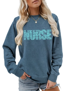 Detail of blue crewneck sweatshirt featuring a creative hollowed Nurse graphic design
