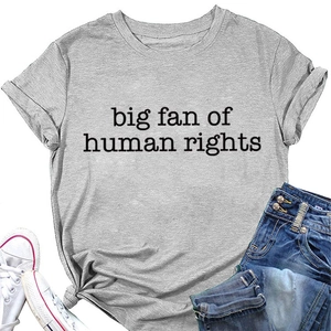 Detail of grey crewneck t-shirt with big fan of human rights print and denim jeans