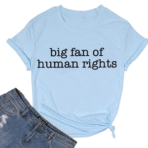 Close-up of light blue cotton T-shirt featuring human rights print and side knot detail