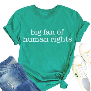 Teal t-shirt with big fan of human rights text paired with blue ripped jeans