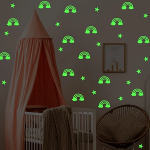 Luminous rainbow and stars wall stickers for kids bedroom showing green fluorescent glow effect