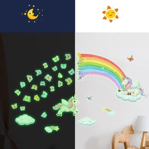 Glow-in-the-dark unicorn and rainbow wall decals for kids' room decor in day and night view