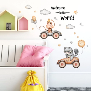 Detail of hand-painted animal racing stickers with balloons on white children room wall