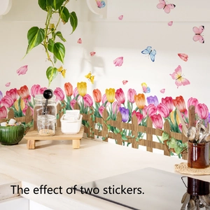 Self-adhesive floral wall stickers with tulips, fence, and butterflies in kitchen setting