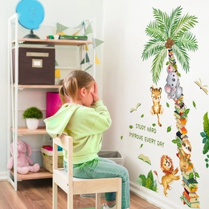 Detailed wall sticker showing a child sitting by cartoon animals and a book tree