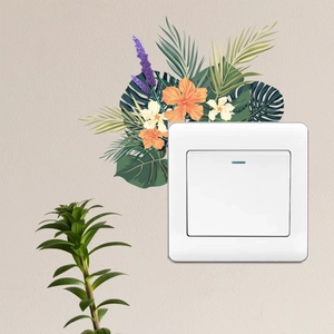Detailed close-up of tropical flower wall decals around a light switch with palm leaves