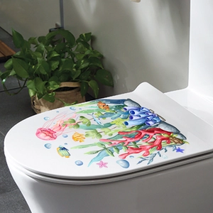Detailed view of ocean world toilet seat stickers with jellyfish and coral designs