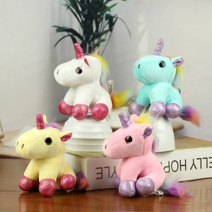 Rainbow unicorn plush keychains in candy colors with glitter horns and fluffy tails