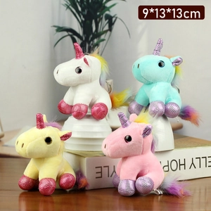 Rainbow unicorn plush keychains in four colors with sequin horns and metal rings