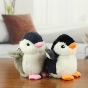 Cute plush penguin keychain set in grey and black with soft fluffy texture and metal rings