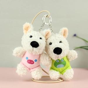 Cute plush West Highland Terrier puppy keychains in pink pig and green frog outfits